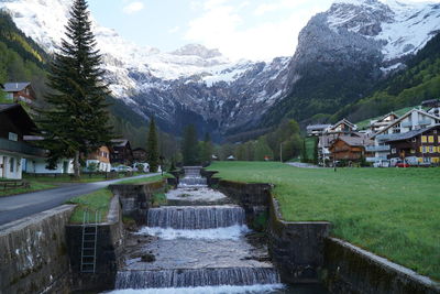 Scenic view of snowcapped mountains against sky during winter