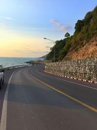 Empty road at sunset