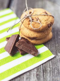 Close-up of cookies with chocolate bars on table