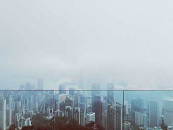 Modern buildings in city against sky