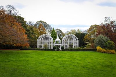 Gazebo in park against sky during autumn