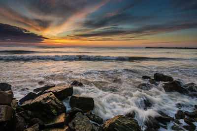 Scenic view of sea against sky during sunset