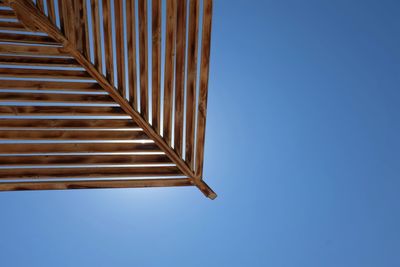 Low angle view of building against clear blue sky