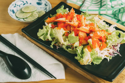 Close-up of salad in plate on table