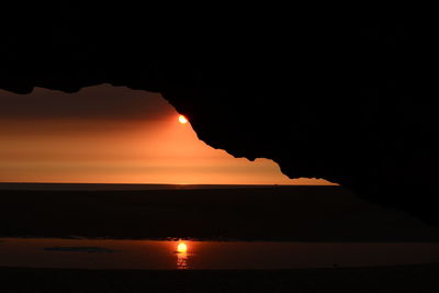 Scenic view of sea against clear sky during sunset