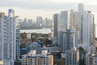 Modern buildings in city against sky