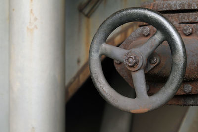 Rusty valve in an abandoned industrial site