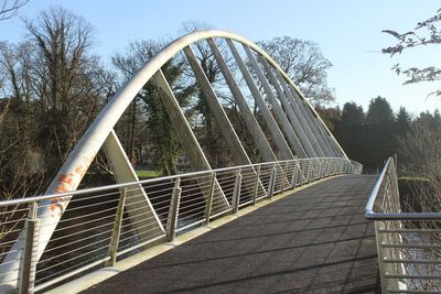 Footbridge against sky