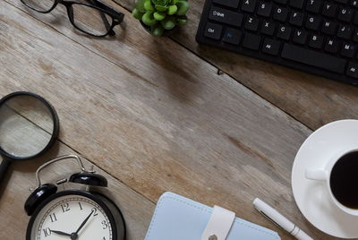 High angle view of coffee cup on table