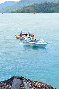 People on boat in sea