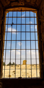 Low angle view of sky seen through glass window