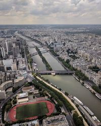 High angle view of river amidst buildings in city