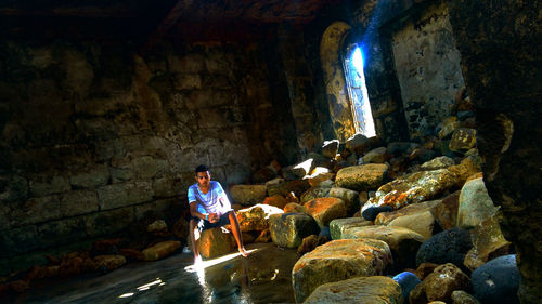 Man standing in cave