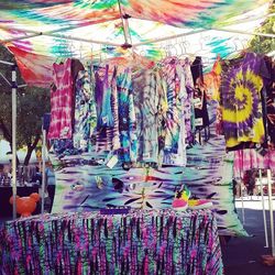 Multi colored umbrellas for sale in market