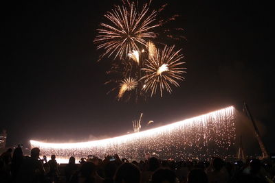 Firework display at night