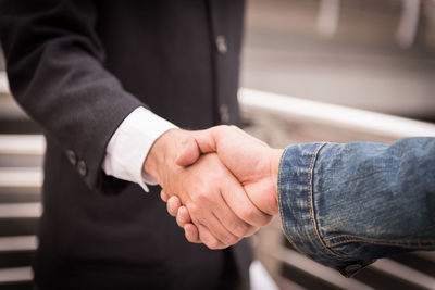 Close-up of business people shaking hands