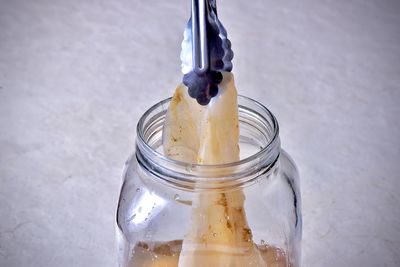 High angle view of drink in glass jar on table