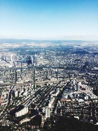 High angle view of city buildings against sky