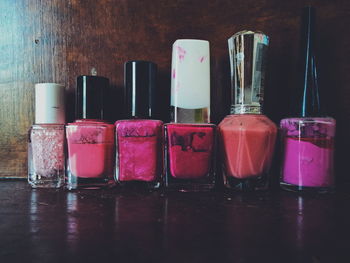 Various nail polish bottles on table