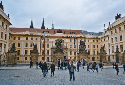 Group of people in front of historical building