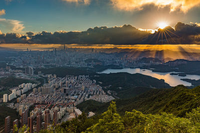 High angle view of cityscape against sky during sunset