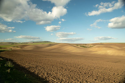 Scenic view of desert against sky