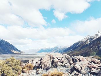 Scenic view of landscape and mountains against sky