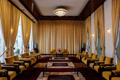 Chairs and table in illuminated room