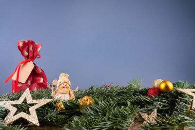 Close-up of christmas tree against sky