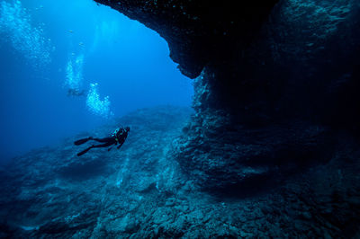 Man swimming in sea