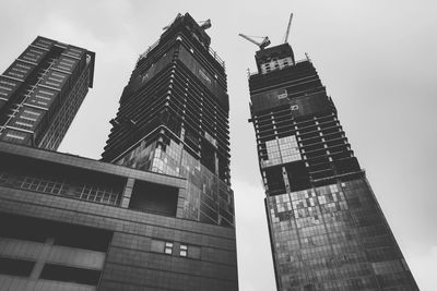 Low angle view of modern buildings against sky