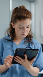 Young woman using mobile phone