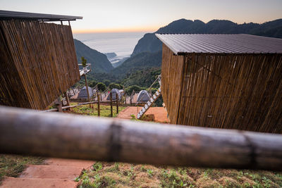 Homestay and tourist tent in the morning with sunrise between beautiful mountains in thailand.