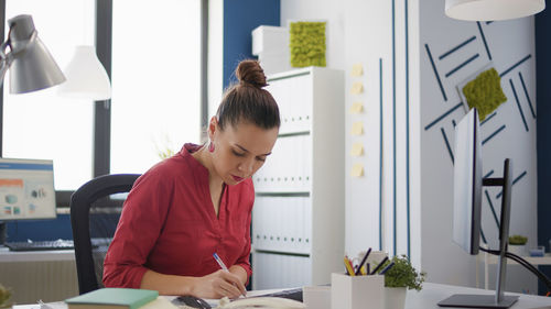 Businesswoman working at office