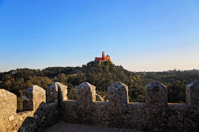 View of old building against blue sky