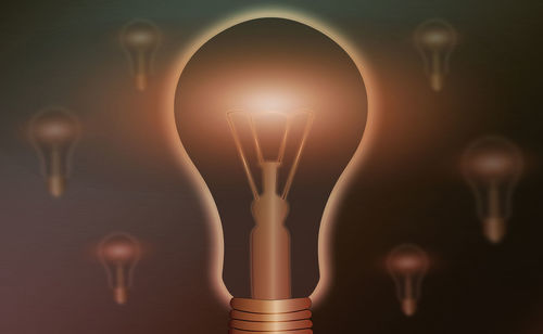 Close-up of illuminated light bulb