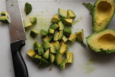 High angle view of chopped vegetables on cutting board