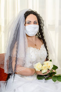 Portrait of woman with bouquet