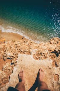 Low section of man on beach