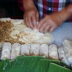 Close-up of man preparing food