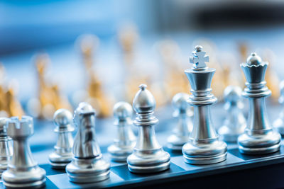 Close-up of chess pieces on board