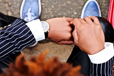 High angle view of man checking time