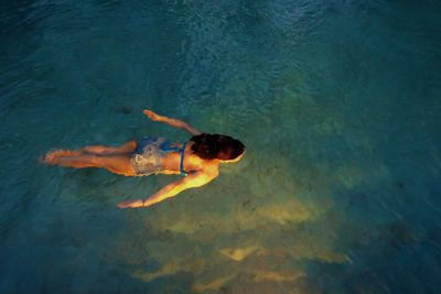 High angle view of person swimming underwater