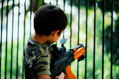 Full length portrait of boy standing outdoors