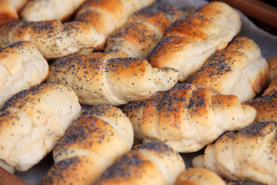 Close-up of bread rolls in basket on table