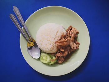 High angle view of meat in bowl on table
