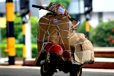 Riding a motorbike wrapped in cardboard, how does it feel, has anyone ever felt it. please tell me