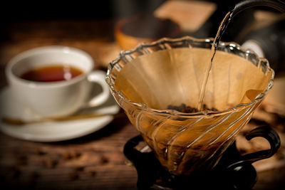 Close-up of coffee cup on table