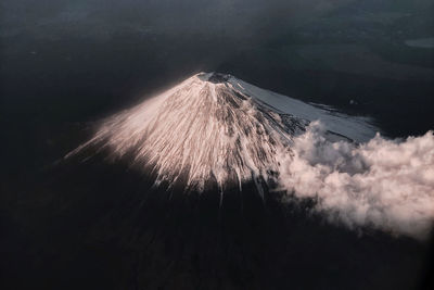 Aerial view of volcano with snow