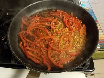 High angle view of meat in cooking pan